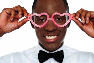 man in heart shaped glasses